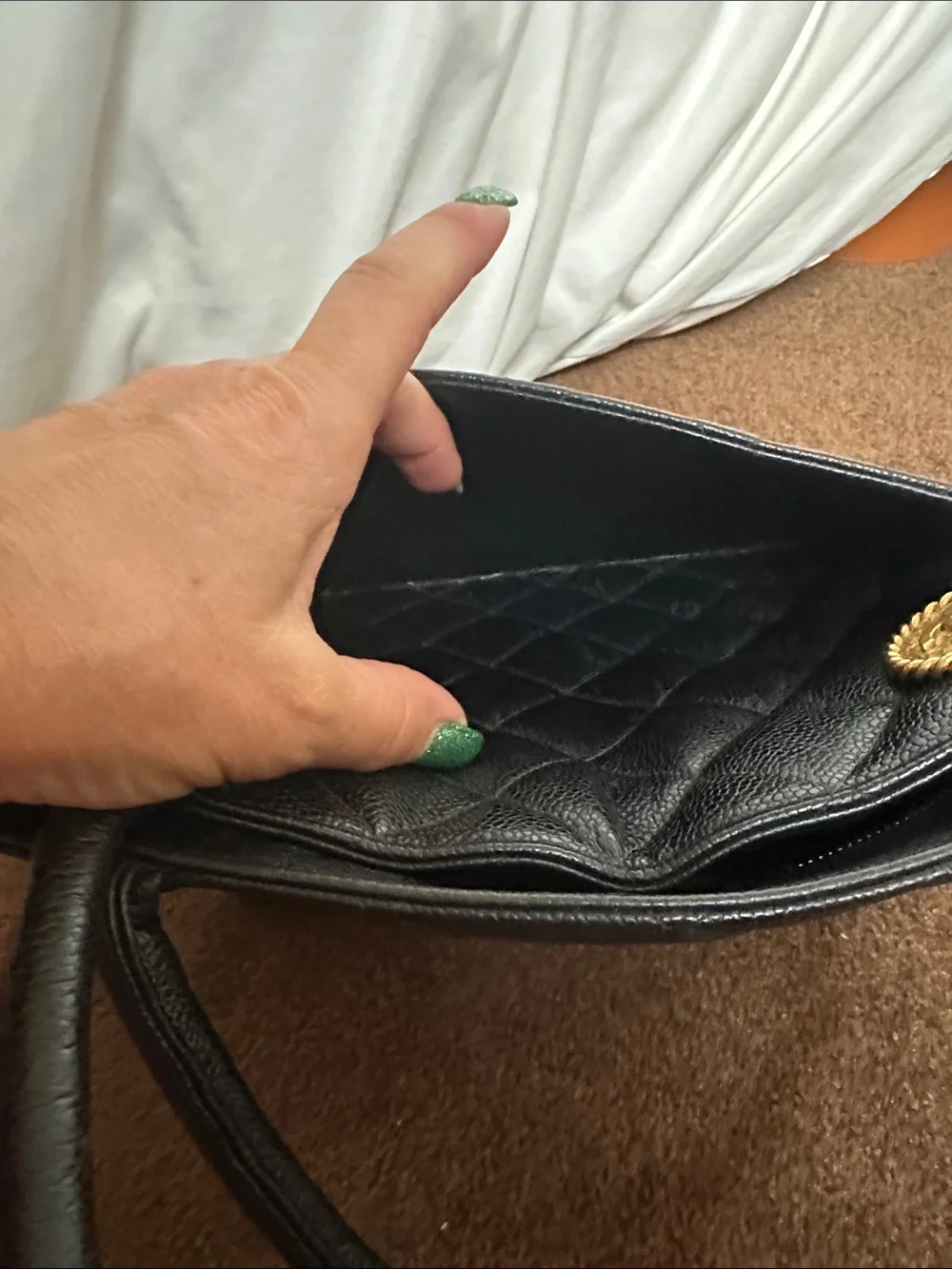 CHANEL Black Quilted Caviar Leather Tote with Gold Medallion Charm